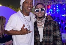 迈博体育 美国说唱歌手与小罗合影-德州扑克迷